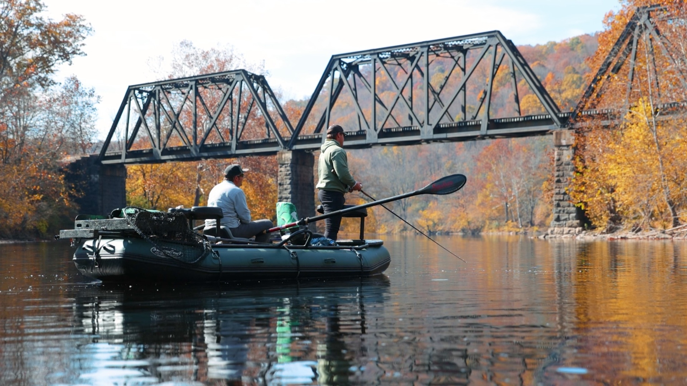 fishing-boat-in-river-fall-leaves